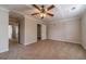 Spacious bedroom with neutral walls, carpet, and a ceiling fan at 2500 Morgan Chase Dr, Buford, GA 30519