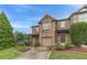 Attractive brick townhome boasting a one-car garage and well-maintained landscaping at 2500 Morgan Chase Dr, Buford, GA 30519