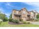 Attractive brick townhome featuring a one-car garage and well-maintained landscaping at 2500 Morgan Chase Dr, Buford, GA 30519
