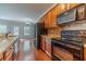Kitchen featuring granite counters and stainless appliances with an island at 2500 Morgan Chase Dr, Buford, GA 30519
