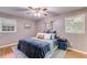 Calming bedroom with a plush bed, soft lighting, and soothing color palette at 2575 Dobbs Nw Dr, Kennesaw, GA 30152