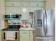 Well-equipped kitchen featuring modern appliances, updated cabinets, and ample counter space at 2575 Dobbs Nw Dr, Kennesaw, GA 30152