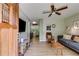 The living room, with hardwood floors, flows seamlessly into the eat-in kitchen at 2575 Dobbs Nw Dr, Kennesaw, GA 30152