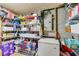 Well-stocked pantry features wire shelving, ample storage space, and easy organization at 2575 Dobbs Nw Dr, Kennesaw, GA 30152