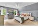 Cozy bedroom featuring two large windows, soft neutral walls, and great natural light at 4020 Devereux Chase, Roswell, GA 30075
