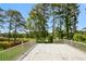 Spacious back deck overlooks a large, tree-lined yard at 2325 E Hill Way, Norcross, GA 30071