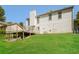 Wide angle view of back exterior with deck, yard and mature trees at 2325 E Hill Way, Norcross, GA 30071