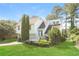 Charming two-story home featuring a spacious front yard and inviting curb appeal at 2325 E Hill Way, Norcross, GA 30071