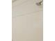 Shower head and vinyl panels in a bathroom, ready for cleaning at 2325 E Hill Way, Norcross, GA 30071
