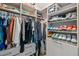 Walk-in closet featuring built-in shelving, rods for hanging clothes and drawers at 250 Pharr Ne Rd # 1814, Atlanta, GA 30305
