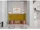 Comfortable lobby seating area with unique chairs and a vibrant accent wall, creating a stylish and inviting space at 250 Pharr Ne Rd # 1814, Atlanta, GA 30305