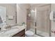 Bathroom featuring a granite countertop vanity and glass shower with tile surround at 4708 Tiger Blvd, Duluth, GA 30096