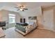 Bedroom featuring a desk, carpet flooring, closet, and a window allowing natural light at 4708 Tiger Blvd, Duluth, GA 30096