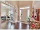 Welcoming foyer featuring dark hardwood floors, leading to a bright and open living space at 4708 Tiger Blvd, Duluth, GA 30096