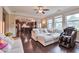 Open concept living room with hardwood floors and ample seating at 4708 Tiger Blvd, Duluth, GA 30096
