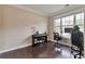 Bright office space with large windows, a piano, and modern furnishings at 4708 Tiger Blvd, Duluth, GA 30096