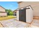 Backyard shed with stone and gravel accents for stylish garden storage at 4708 Tiger Blvd, Duluth, GA 30096