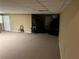 Spacious finished basement offers potential for recreation or storage at 1159 Aurora Ct, Atlanta, GA 30338
