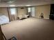 Spacious basement featuring ample carpeted space, neutral colors and natural light at 1159 Aurora Ct, Atlanta, GA 30338