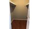 A walk in closet with shelves and hardwood floor at 1159 Aurora Ct, Atlanta, GA 30338