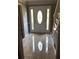 A foyer with tile floor, a white door with windows on each side, and stairs on the right at 1159 Aurora Ct, Atlanta, GA 30338