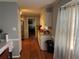 Traditional kitchen with stainless steel appliances, wood floors, and granite countertops at 1159 Aurora Ct, Atlanta, GA 30338