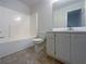 Clean bathroom featuring a shower-tub combo, and a single sink vanity at 132 Lynnview Ct, Mcdonough, GA 30252