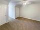 Neutral bedroom with carpeted floor and spacious closet at 132 Lynnview Ct, Mcdonough, GA 30252