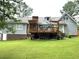 Beautiful backyard with large wooden deck at 2884 Overwood Ln, Snellville, GA 30078