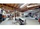 Unfinished basement featuring exposed duct work and wooden ceiling rafters at 2884 Overwood Ln, Snellville, GA 30078