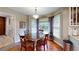 Cozy breakfast nook with a round table and a view of the backyard at 2884 Overwood Ln, Snellville, GA 30078