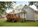 Charming home exterior with gray siding and a wooden deck at 2884 Overwood Ln, Snellville, GA 30078