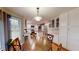 Open kitchen and breakfast area, with hardwood floors and ample natural light at 2884 Overwood Ln, Snellville, GA 30078