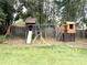 Backyard with playground featuring swings, slide, and playhouse at 2884 Overwood Ln, Snellville, GA 30078