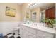 Stylish bathroom featuring checkerboard floors, wainscoting, and ample counter space with decor at 1935 Northbrooke Ln, Dunwoody, GA 30338