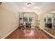 Bonus room featuring hardwood floors, exercise equipment, and a large window with natural light at 1935 Northbrooke Ln, Dunwoody, GA 30338