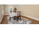 Inviting dining area featuring hardwood floors and soft color palette that enhances the space at 1935 Northbrooke Ln, Dunwoody, GA 30338