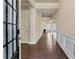Inviting foyer with hardwood floors and detailed trim leading into the open living space at 1955 Overlook Run Pl, Cumming, GA 30040