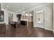 Open layout kitchen with center island, dark wood cabinetry, and breakfast nook at 1955 Overlook Run Pl, Cumming, GA 30040