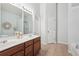 Elegant bathroom featuring dual sinks, ample counter space, and updated fixtures at 2910 Cross Creek Dr, Cumming, GA 30040