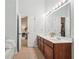 Bright bathroom features double vanity, and tile flooring at 2910 Cross Creek Dr, Cumming, GA 30040