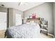 Inviting bedroom featuring neutral tones, a plush bed, and stylish decor at 2910 Cross Creek Dr, Cumming, GA 30040