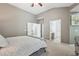A bedroom featuring neutral tones with en suite bath at 2910 Cross Creek Dr, Cumming, GA 30040