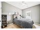 Cozy bedroom features a comfortable bed with plush bedding and natural light at 2910 Cross Creek Dr, Cumming, GA 30040