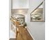 Entryway features hardwood floors, stairs and archways that lead to living spaces at 2910 Cross Creek Dr, Cumming, GA 30040