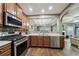 Well-equipped kitchen with stainless steel appliances and ample counter space at 2910 Cross Creek Dr, Cumming, GA 30040