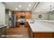 Modern kitchen features stainless steel appliances, light countertops, and stylish wood cabinets at 2910 Cross Creek Dr, Cumming, GA 30040