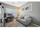 Home office with a comfortable sofa and area rug. Perfect place to work from home at 2910 Cross Creek Dr, Cumming, GA 30040