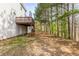 Spacious backyard with wooded backdrop, offering a serene and private outdoor setting at 3448 Craggy Perch, Douglasville, GA 30135