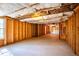 Large unfinished basement with exposed framing, concrete floor and potential for customization at 3448 Craggy Perch, Douglasville, GA 30135